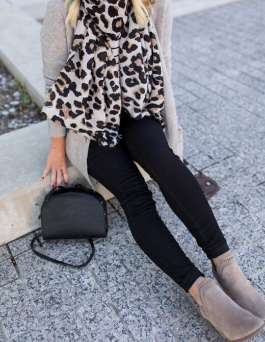 black jeans and taupe booties
